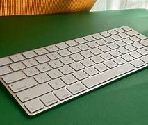 Image result for Apple Magic Keyboard Blue Mouse