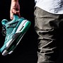 Image result for Teal Jordan 4S On Feet