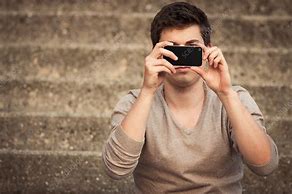 Image result for Person Taking Picture with Phone