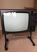 Image result for Picture of a Old TV with Wheels