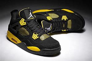 Image result for Air Jordan 4 Black and Yellow