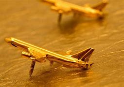 Image result for Gold Airplane Globe