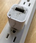 Image result for Burnt iPhone Charger in the Socket