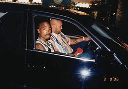 Image result for Tupac Flipping Off