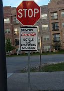 Image result for Slow Down for a Low Place in the Roadway