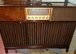 Image result for Magnavox Stereo Console Air Suspension Speakers