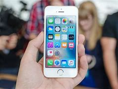 Image result for iPhone SE in Hand 2016