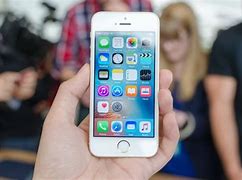 Image result for iPhone SE in the Hand of Soemone