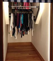 Image result for Rotating Clothes Rack Closet