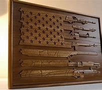 Image result for American Flag Made Out of Guns