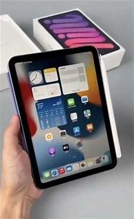 Image result for iPad 6 Mini Next to iPhone