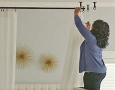 Image result for Drapes Hanging From Ceiling