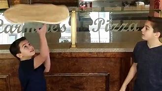 Image result for Pizza Spinning Contest