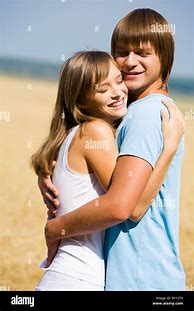 Image result for A Boy Hugging His Girlfriend Sitting