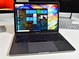 Image result for Apple Laptop Pro with Touch Bar