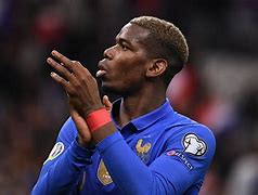Image result for Paul Pogba in Suit at Meeting