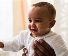 Image result for Baby Looking Curiously at iPhone