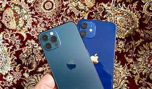 Image result for iPhone 13 Mini Size Next to iPhone 12