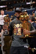 Image result for LeBron Holding Trophy in Miami