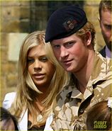 Image result for Prince Harry with Chelsea Protecting Face From Camera Flashes
