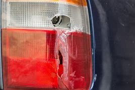 Image result for Police Car Tail Light Broken