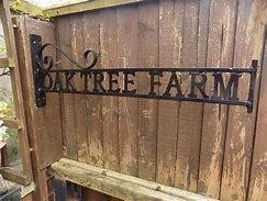 Image result for Wrought Iron Letters Outdoor Wood Signs