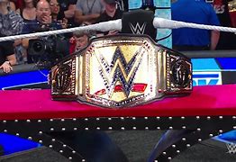 Image result for Roman Reigns 3 Title Belts