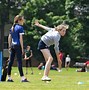 Image result for Picture of People Playing Cricket in a Community