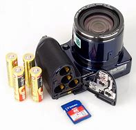 Image result for Camera with AA Batteries