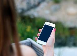 Image result for Crouching Holding iPhone