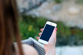 Image result for Girl Holding iPhone