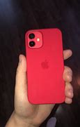 Image result for Red iPhone with a Hand