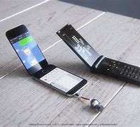 Image result for Futuristic Flip Phone