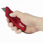 Image result for Changing Blade On Milwaukee Utility Knife