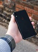 Image result for iPhone XR Next to Hand