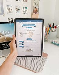 Image result for Business Image of an iPad and Notebook