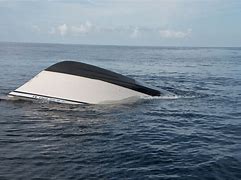 Image result for Capsized Boat