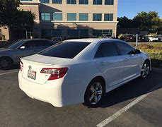 Image result for White Toyota Camry 76