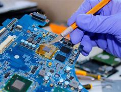 Image result for Laptop Being Fixed