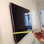 Image result for Wall Mounted TV with Sound Bar