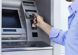 Image result for Person Using ATM Machine