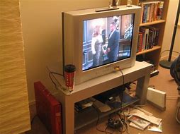 Image result for 32 Inch TV Insignia On Table