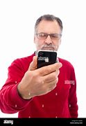 Image result for A Person Holding a iPhone 13