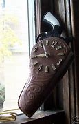 Image result for Spartus Gun in Holster Clock