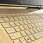 Image result for Windows 11 Laptop Gold Colored