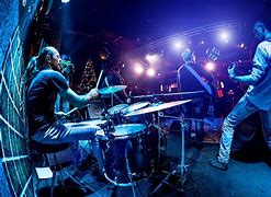 Image result for Band Standing Together On Stage