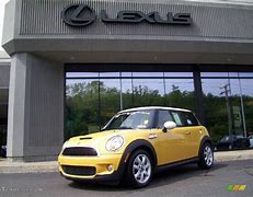 Image result for 2008 Yellow Mini Cooper S