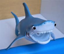 Image result for Squeaky Shark Toy