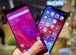 Image result for iPhone 11 Pro Yellow vs Xr