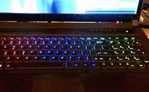 Image result for Pink Apple Laptop with Light Up Keyboard